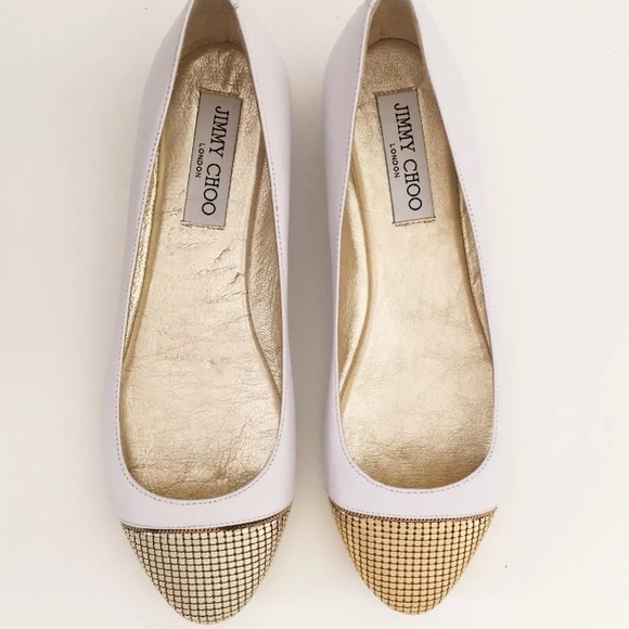 white and gold flats